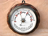 19th century Oak cased marine barometer with ceramic dial by Hutchinson & Jackson.